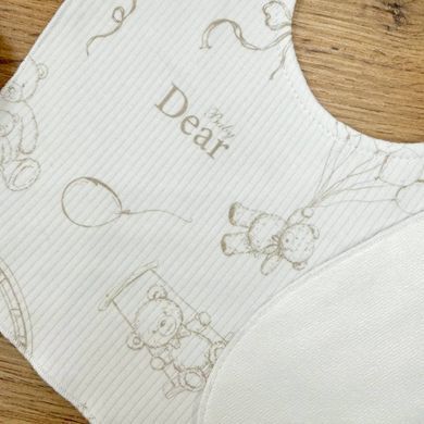 Слинявчик трикотаж-рубчик/непромокаюча мембрана "Baby Dear" бежевий &mdash; купити в Bubbleshop